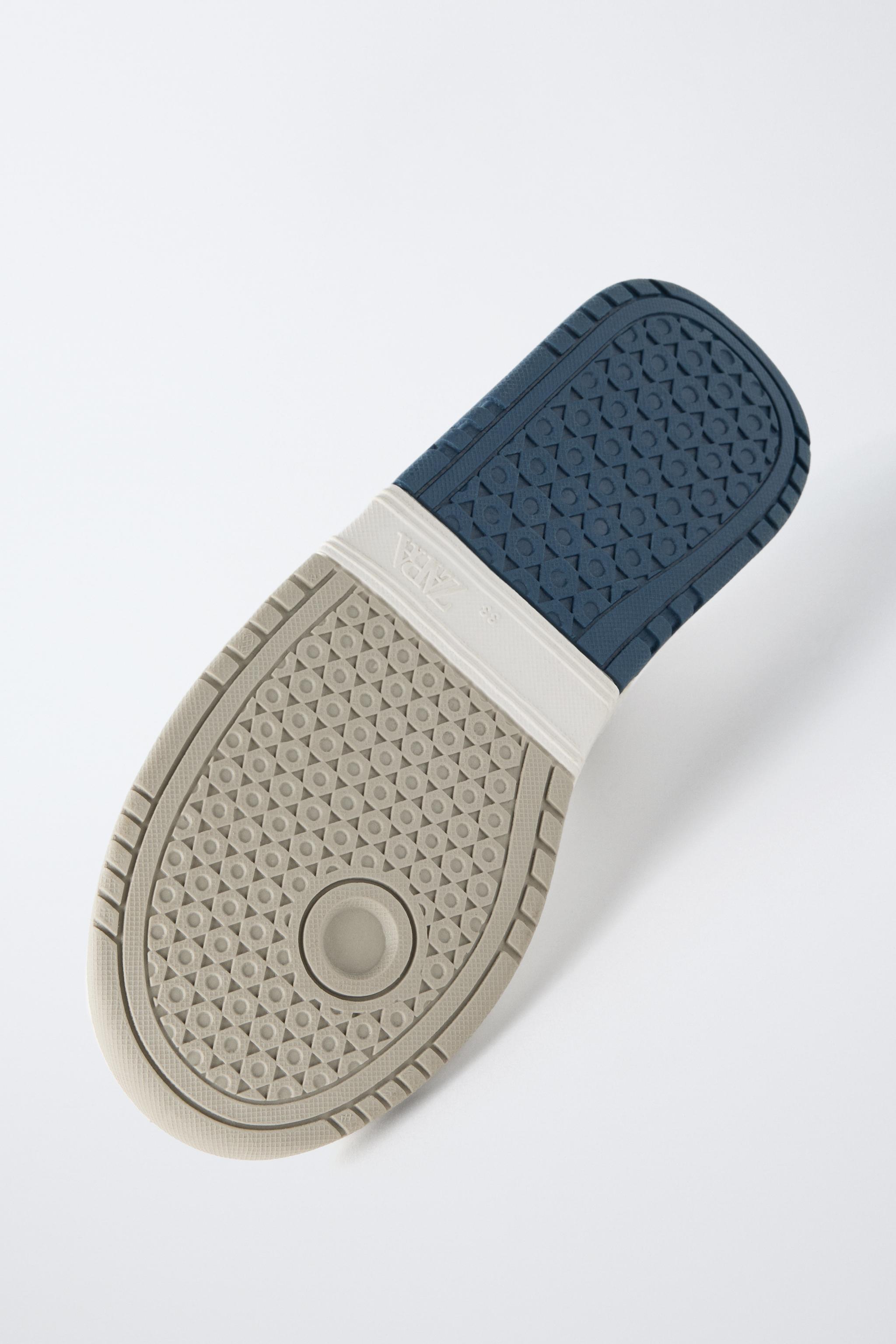 PIECED HIGH TOP SNEAKERS